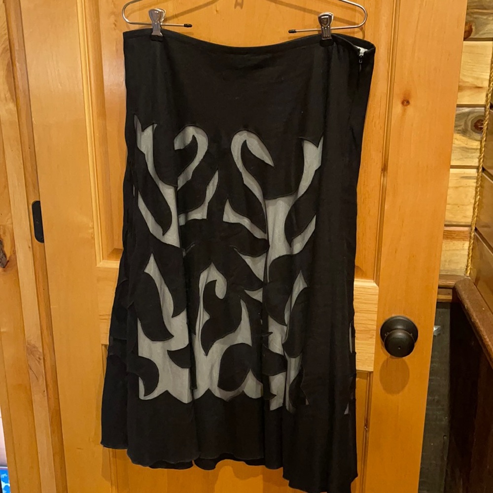 Mid calf black skirt with white underlay